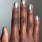 Shimmering silver Atomica metallic nail polish in two coats