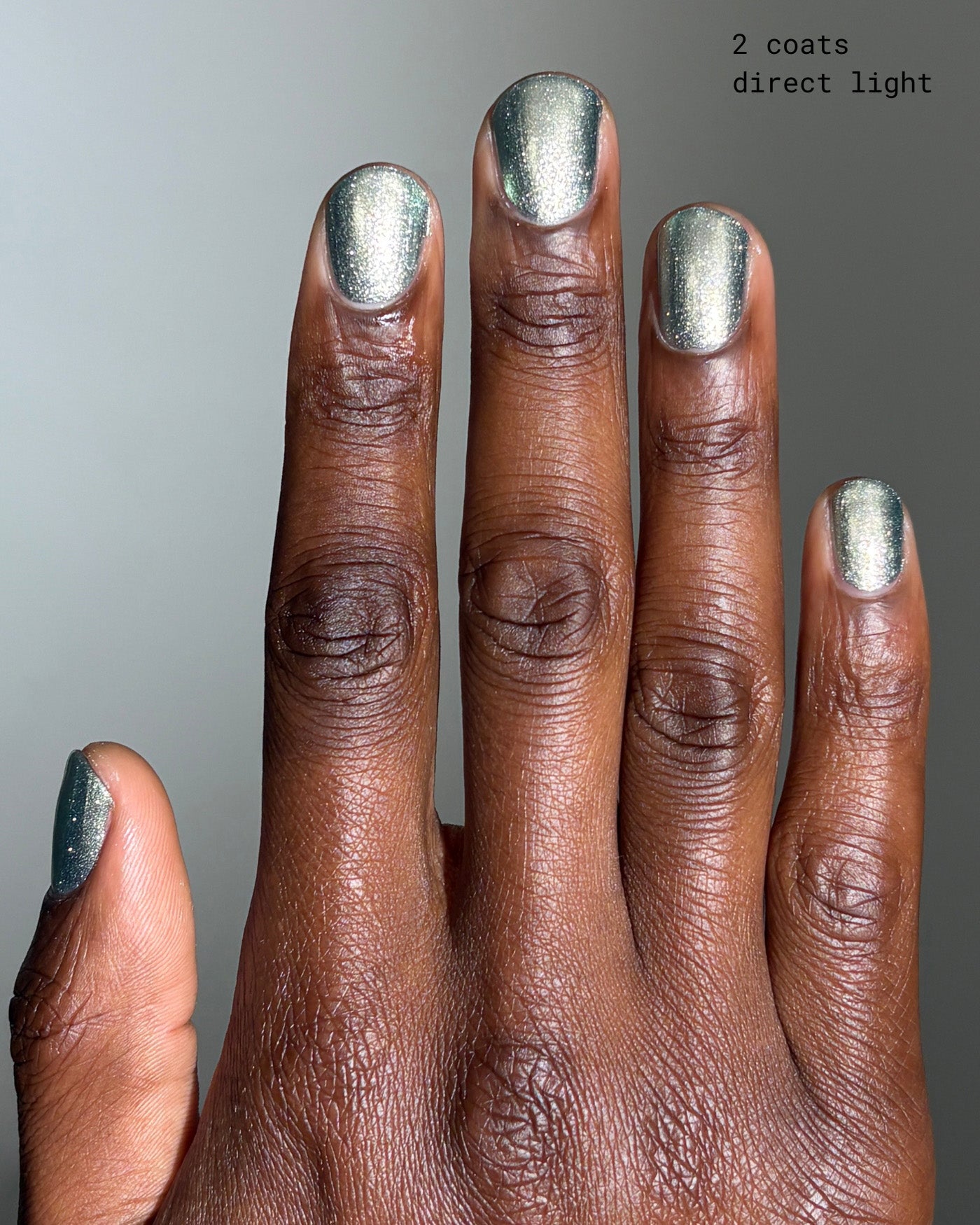 Shimmering silver Atomica metallic nail polish in two coats