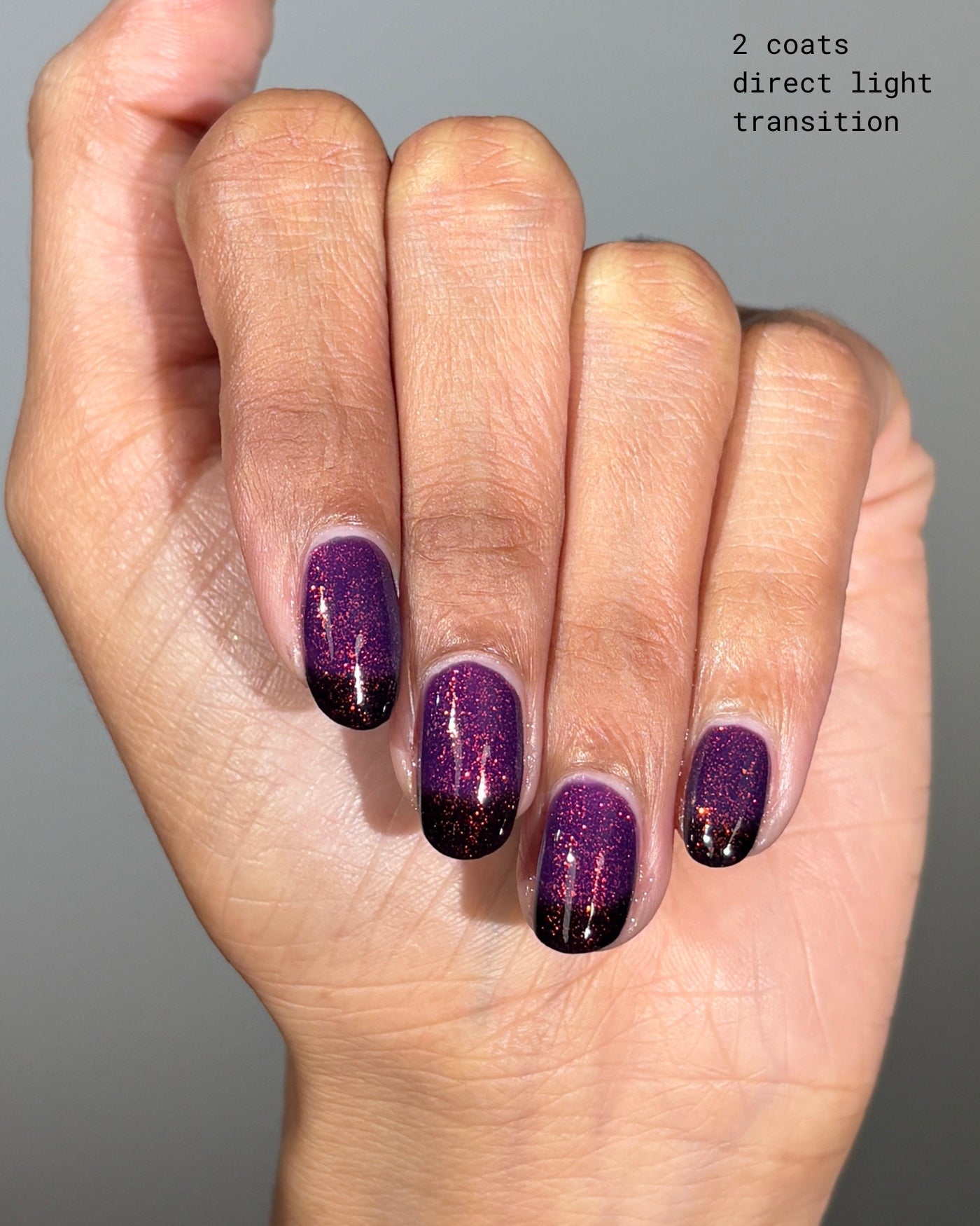 The Firebird purple black gradient glitter nail polish