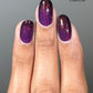 Purple glitter nail polish The Firebird with shimmering iridescent finish