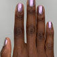 Shimmering lavender Nightbreak metallic nail polish in one coat under indirect light