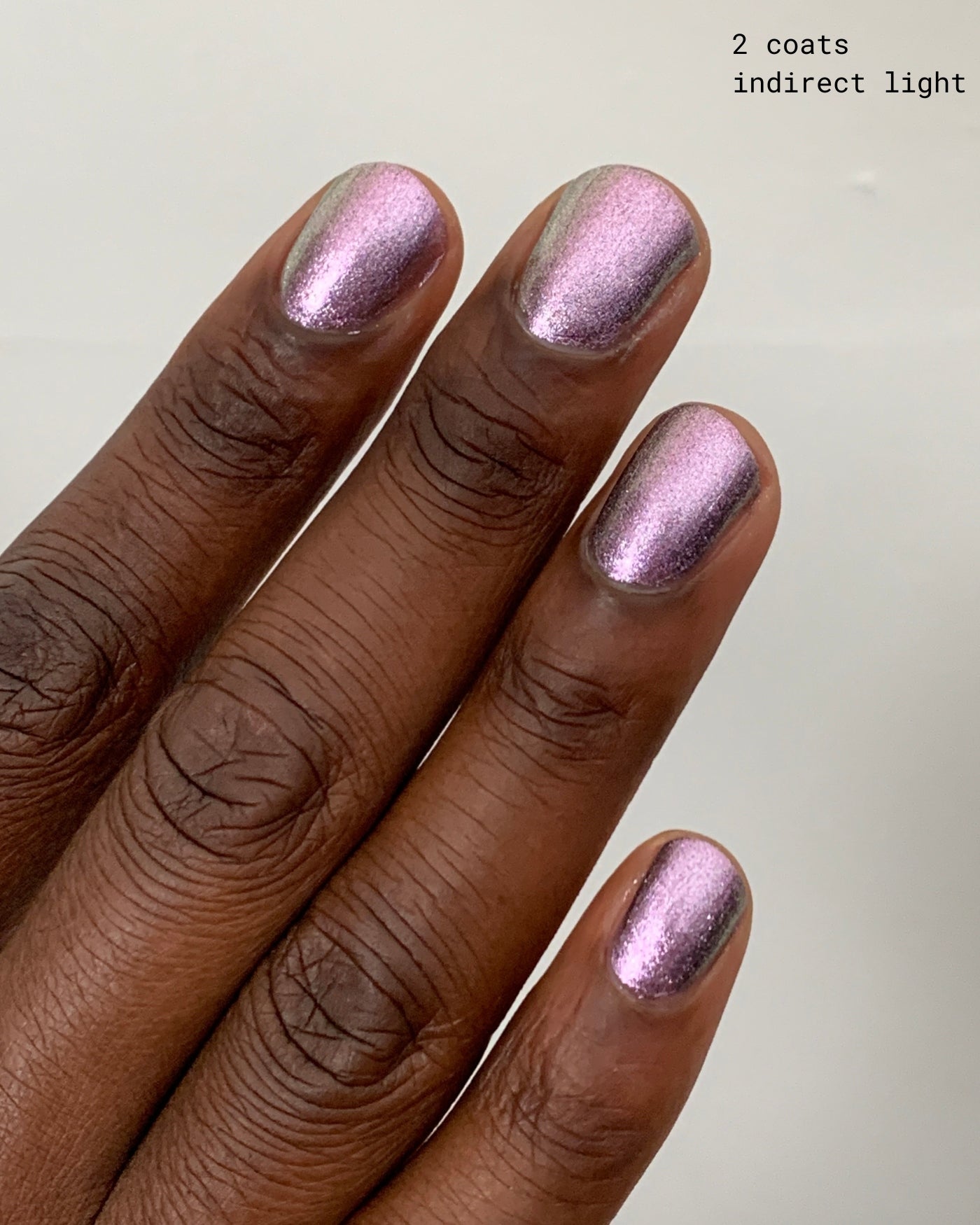 Shimmering lavender metallic Nightbreak nail polish in two coats
