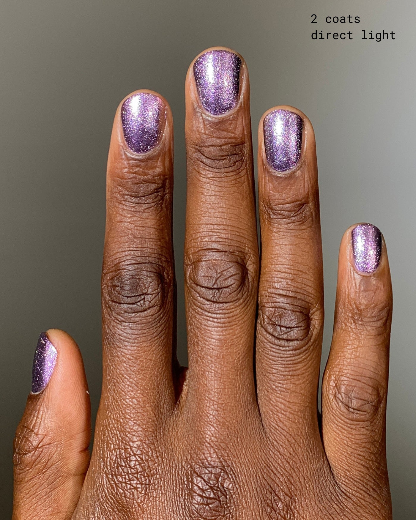 Nightbreak purple glitter nail polish in two coats