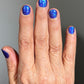 Vibrant blue glitter nail polish by House of Hades in Sugar and Spice Topper