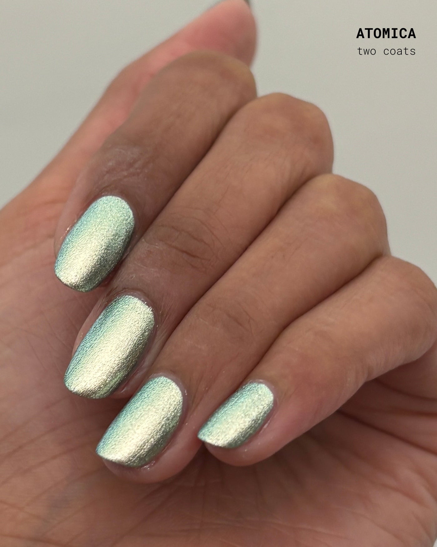 Shimmering mint green metallic nail polish, two coats, Band Of Misfits II Set