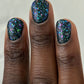 Sugar and Spice Topper: dark green nail polish with blue purple pink iridescent glitter