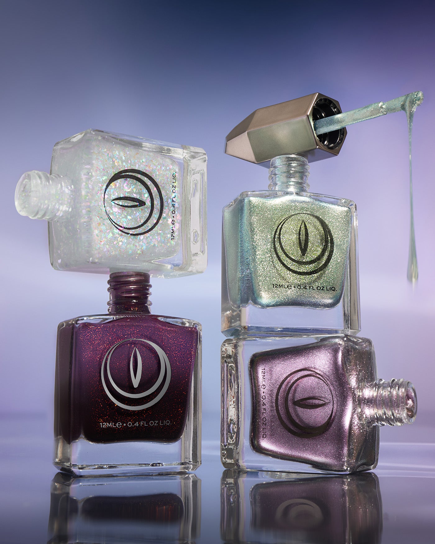 Band Of Misfits II Set: 4 glittery purple, green, silver nail polishes