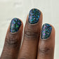 Sugar and Spice Topper: dark green nail polish with iridescent blue, purple, pink glitter